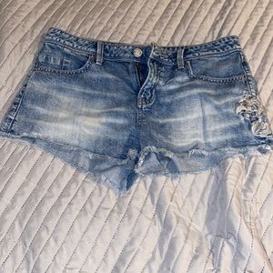 Buckle black jean shorts